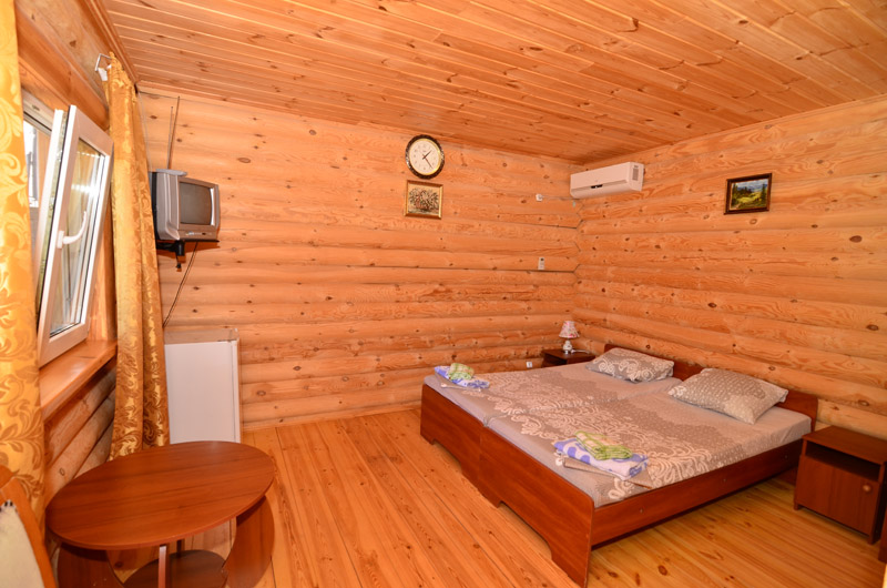 Деревянный коттедж (эко-дом) 2-местный номер. Гостевой дом «В гостях у Тихона». Заозерное