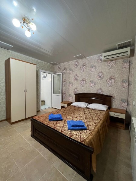 Двухместный улучшенный стандартный номер с двухспальной кроватью. Гостевой дом "Виолетта". Лоо