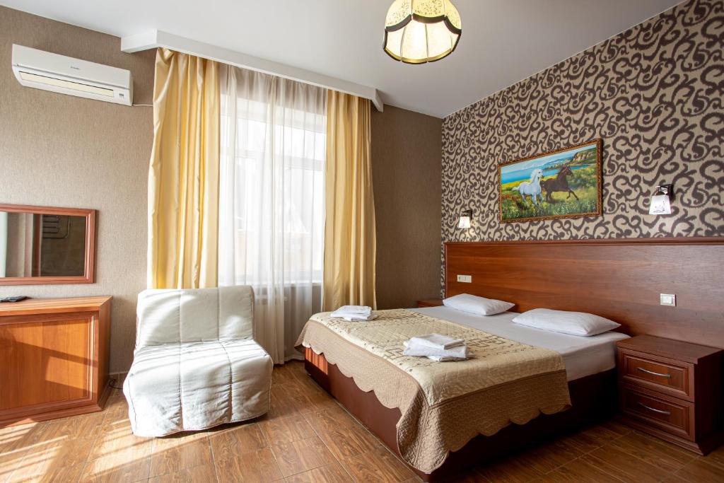 Стандартный трехместный номер. Отель Атмосфера. Кабардинка