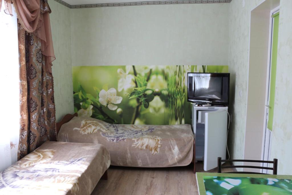 ЧЕТЫРЕХМЕСТНЫЙ В ДЕРЕВЯННОМ СТИЛЕ. Гостевой дом "Сибирячка". Ольгинка