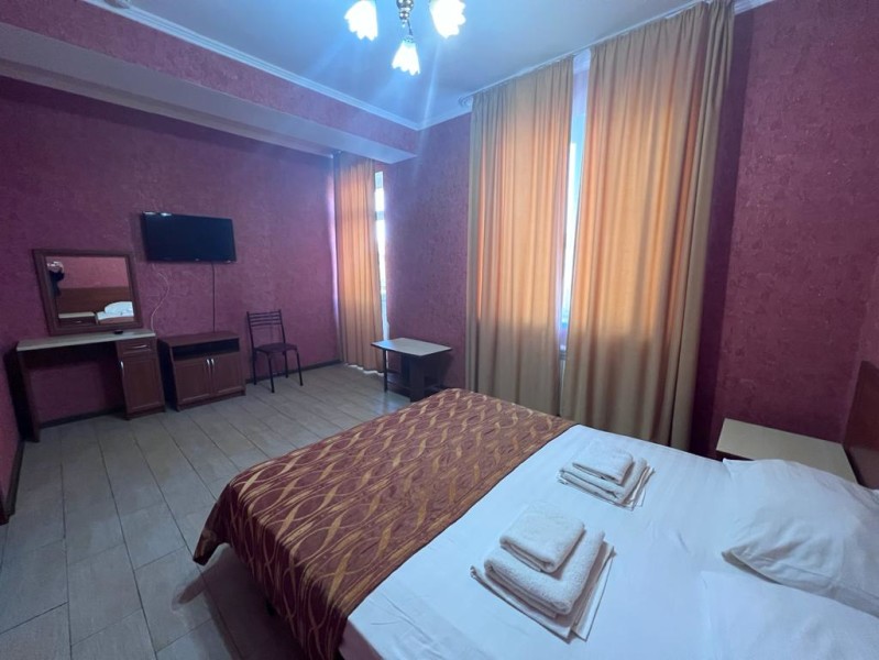 Двухкомнатный номер. Гостевой дом “Илиос”. Анапа