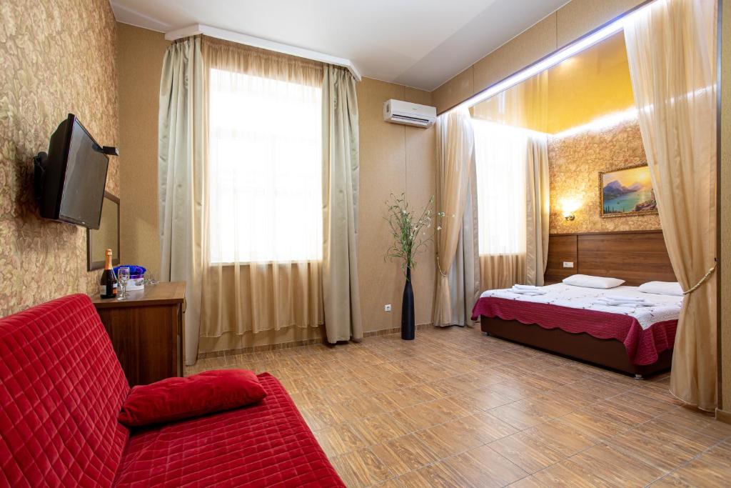 Четырехместный номер. Отель Атмосфера. Кабардинка