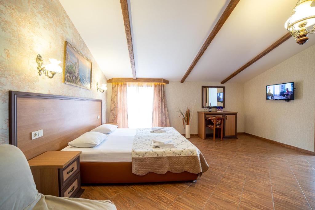 Люкс с 2 спальнями. Отель Атмосфера. Кабардинка