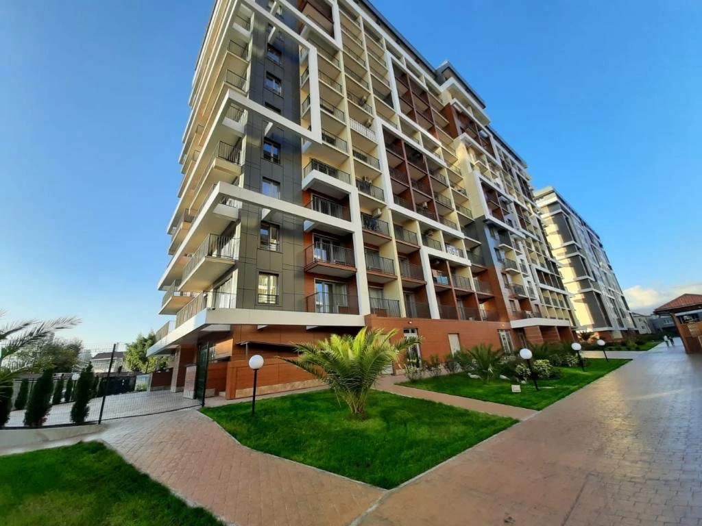 . Квартира в многоквартирном доме Современная квартира у моря с отдельной спальней. Дагомыс