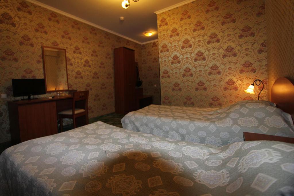 Бюджетный двухместный номер с 2 отдельными кроватями. гостиница "Альпийская Сказка". Красная Поляна