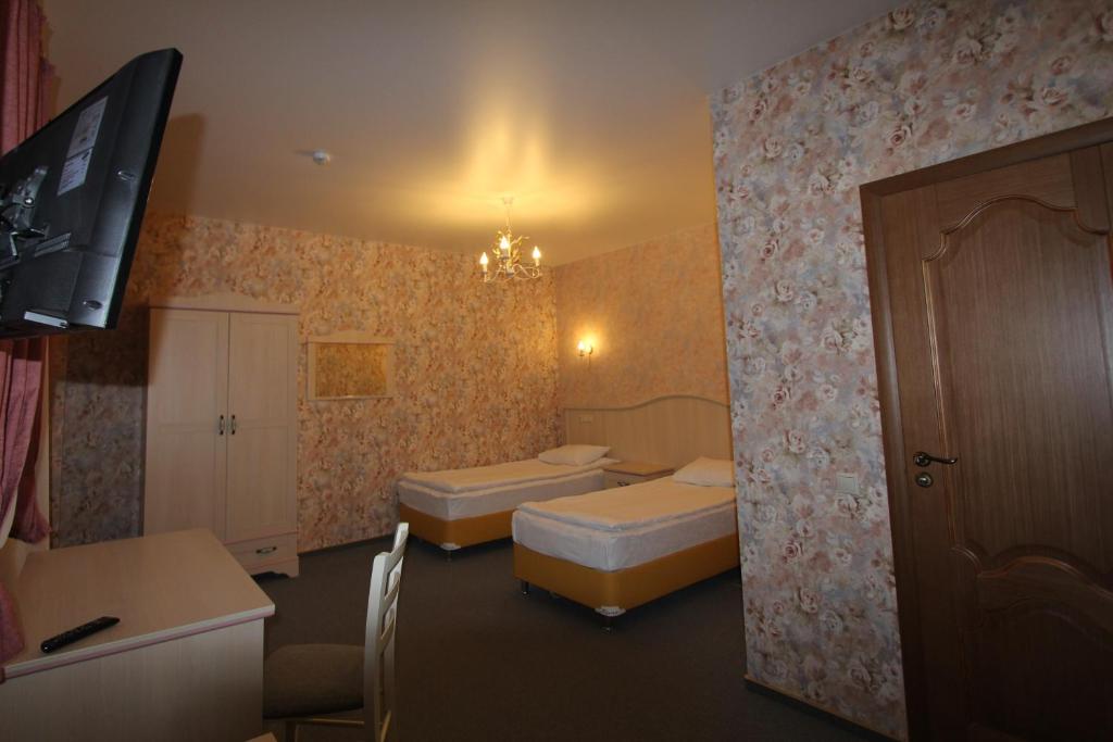 Двухместный номер с 1 кроватью или 2 отдельными кроватями, вид на горы. гостиница "Альпийская Сказка". Красная Поляна