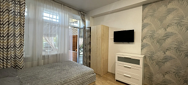 Квартира в многоквартирном доме Апартамент с терасой на первой береговой