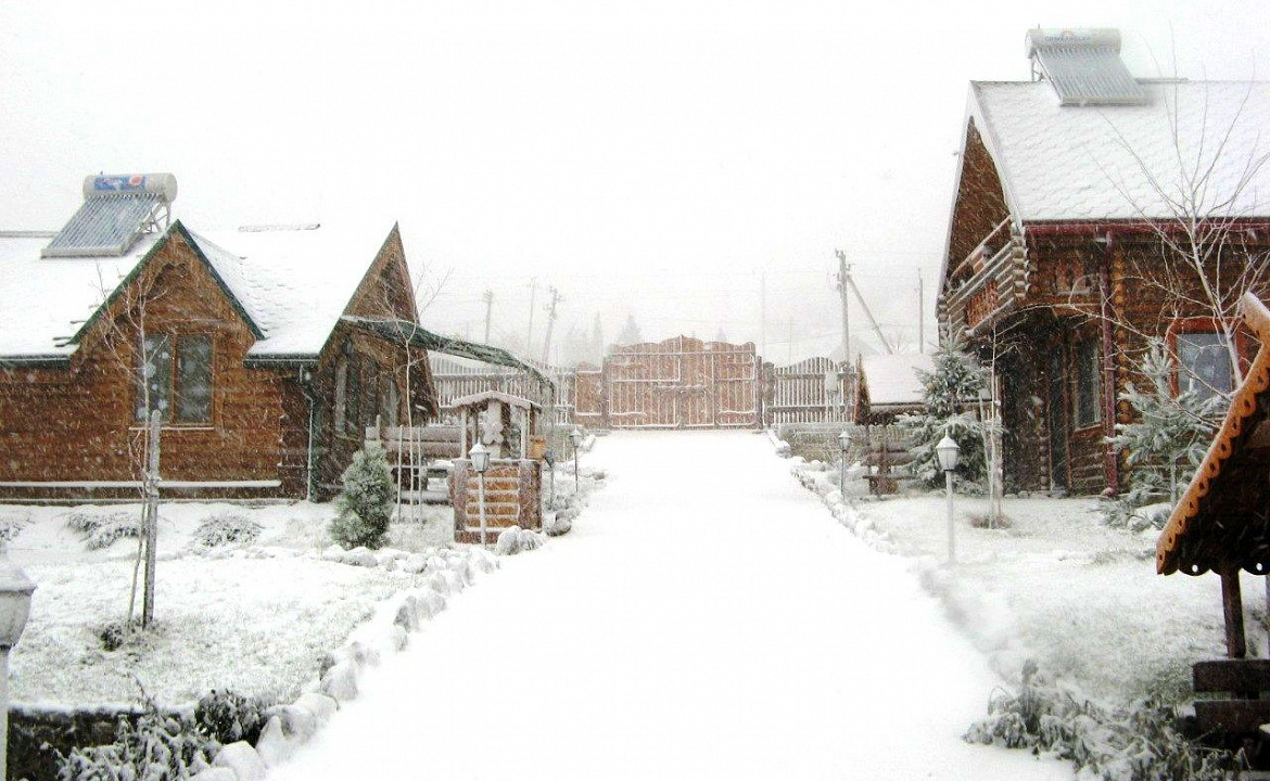 Двухэтажный деревянный коттедж категории 