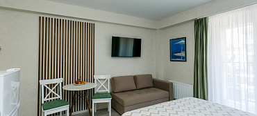 Квартира в многоквартирном доме Стильный апартамент на первой береговой с видом на море