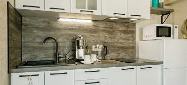 Квартира в многоквартирном доме Стильный апартамент на первой береговой с видом на море