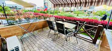 Квартира в многоквартирном доме Светлая студия у моря с террасой