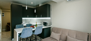 Квартира в многоквартирном доме Просторный апартамент с видом н а море и горы