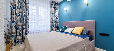 Квартира в многоквартирном доме Современная квартира у моря с отдельной спальней