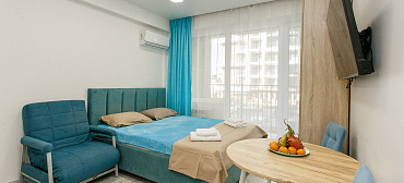 Квартира в многоквартирном доме Стильная студия у самого моря