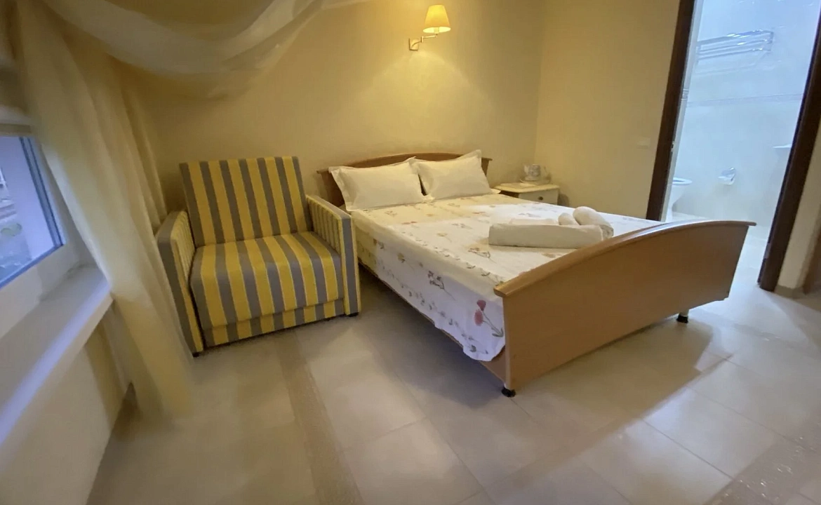 Стандартный двухместный номер. Отель Пионер. Лоо