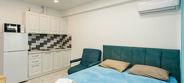 Квартира в многоквартирном доме Стильная студия у самого моря