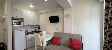 Квартира в многоквартирном доме Стильный апартамент с красивым видом на море и горы