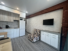 Квартира в многоквартирном доме Светлая студия с шикарным видом на морской закат