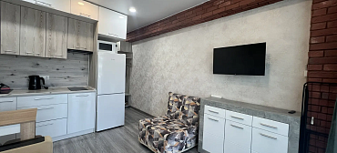 Квартира в многоквартирном доме Светлая студия с шикарным видом на морской закат