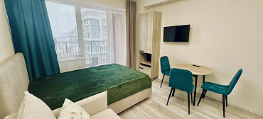 Квартира в многоквартирном доме Уюрный апартамент на первой береговой