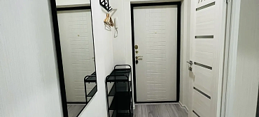 Квартира в многоквартирном доме Уюрный апартамент на первой береговой