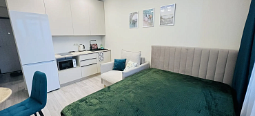 Квартира в многоквартирном доме Уюрный апартамент на первой береговой