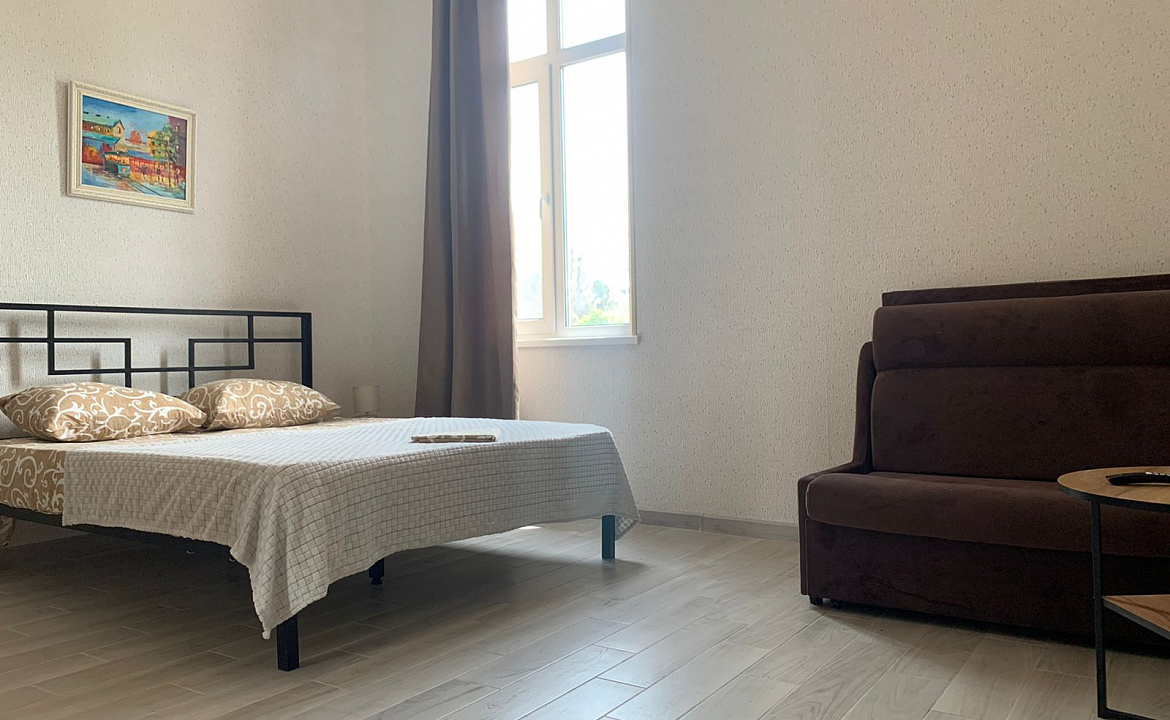 Апартаменты с кухней на два номера. Гостевой дом ЭЙВА. Пицунда