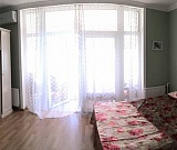 Комната с кроватью king-size и видом на море. Гостевой дом "Тихая Гавань". Комната с кроватью king-size и видом на море. Гостевой дом "Тихая Гавань".