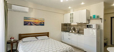 Квартира в многоквартирном доме Стильный апартамент на первой береговой с видом на море