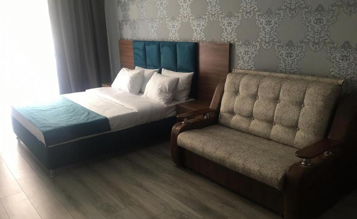 СТАНДАРТНЫЙ 4- МЕСТНЫЙ НОМЕР С ДИВАНОМ И БАЛКОНОМ. Гостевой дом "Family". Лазаревское СТАНДАРТНЫЙ 4- МЕСТНЫЙ НОМЕР С ДИВАНОМ И БАЛКОНОМ. Гостевой дом "Family". Лазаревское