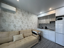 Квартира в многоквартирном доме Светлая студия с шикарным видом на морской закат