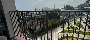 Квартира в многоквартирном доме Уюрный апартамент на первой береговой