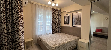 Квартира в многоквартирном доме Стильный апартамент с красивым видом на море и горы