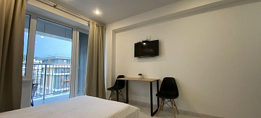 Квартира в многоквартирном доме Квартира на первой береговой линии с красивым видом на морской закат