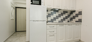 Квартира в многоквартирном доме Стильная студия у самого моря