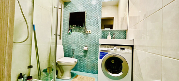 Квартира в многоквартирном доме Уюрный апартамент на первой береговой