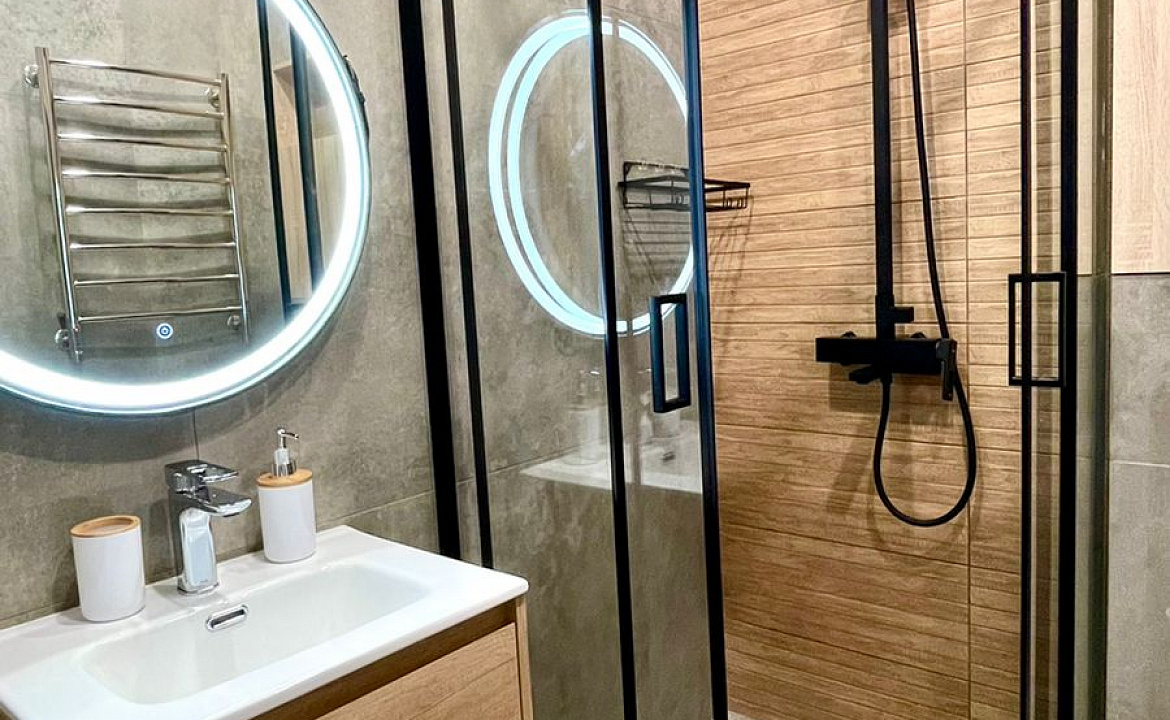 Апартаменты Red Glade. Квартира в многоквартирном доме Двухуровневая студия. Красная Поляна