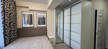 Квартира в многоквартирном доме Стильный апартамент с красивым видом на море и горы