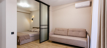 Квартира в многоквартирном доме Квартира на первой линии с отдельной спальней