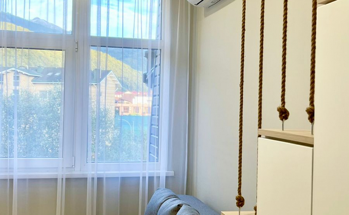 Апартаменты Red Glade. Квартира в многоквартирном доме Двухуровневая студия. Красная Поляна