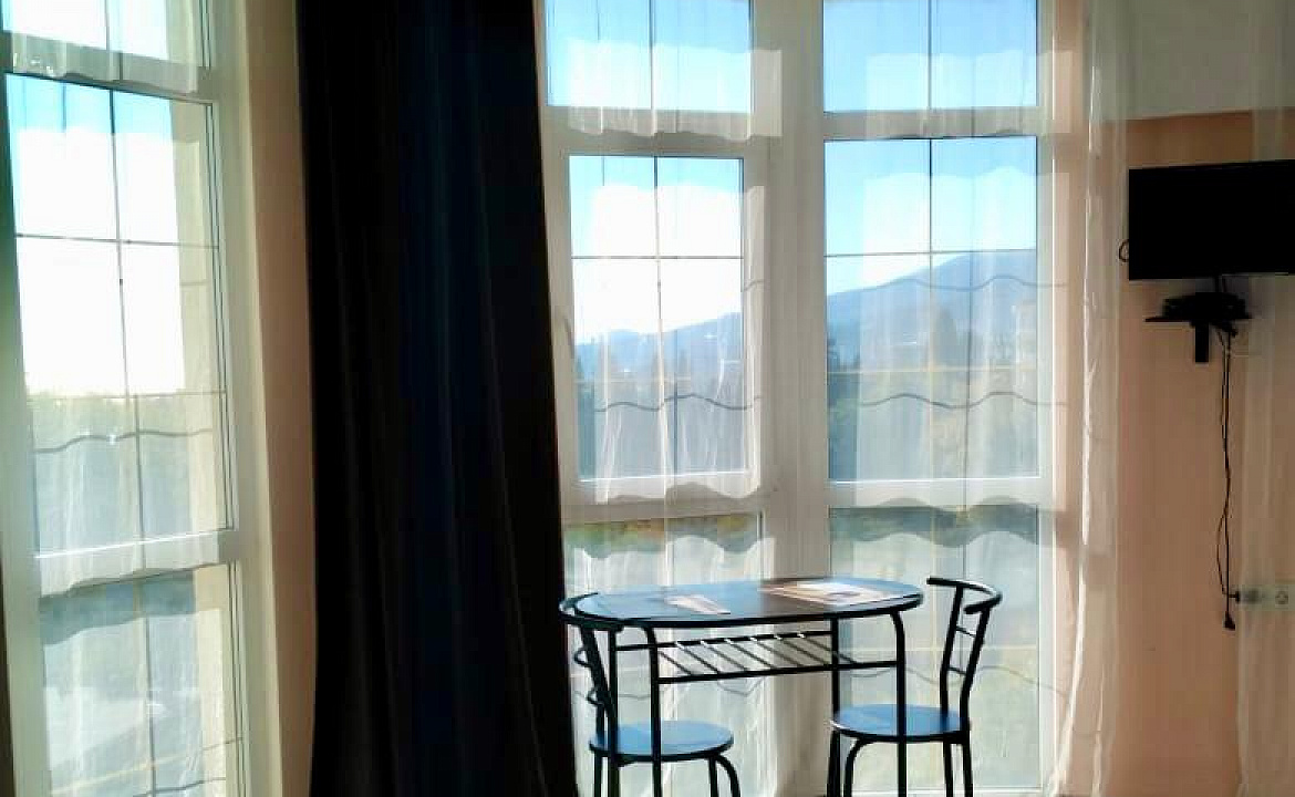 Круглый видовой номер. Отель Апарт отель "Дуэт". Ялта