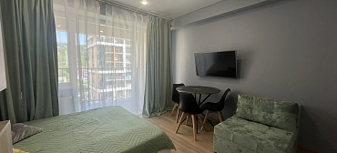 Апартамент с видом на морее и горы