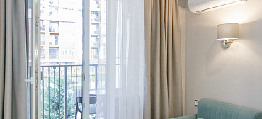 Квартира в многоквартирном доме Современный апартамент на первой береговой