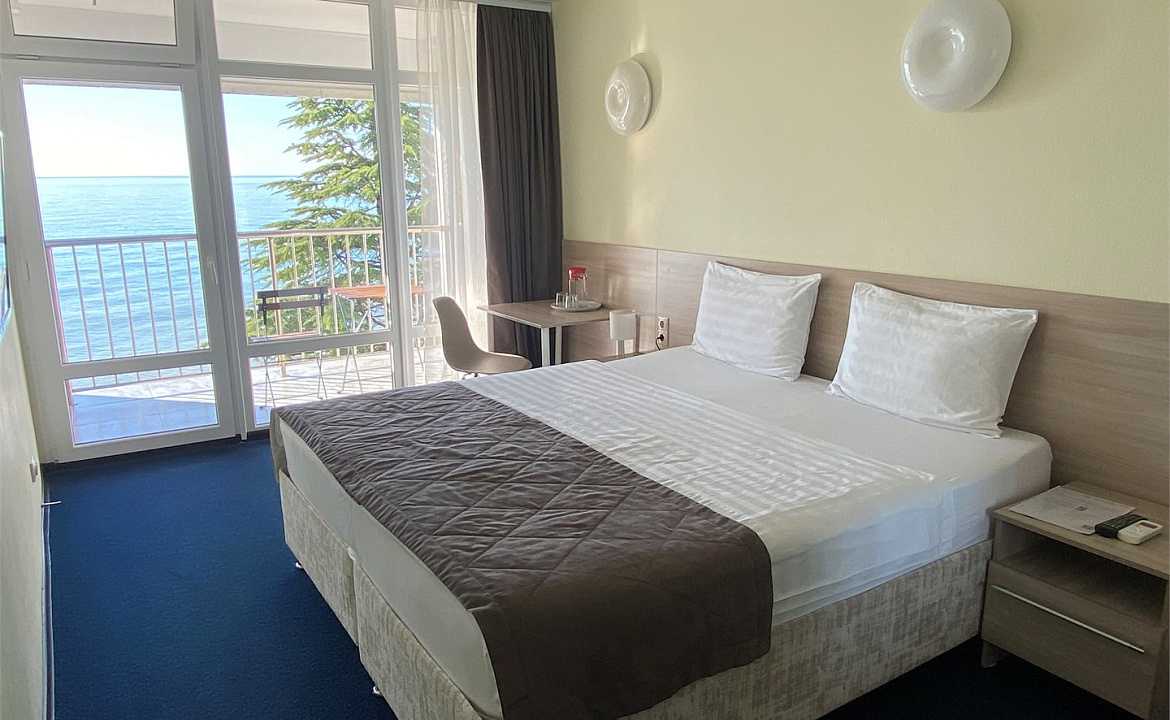 Улучшенный номер с балконом. Курортный отель COOCOOROOZA. Сочи