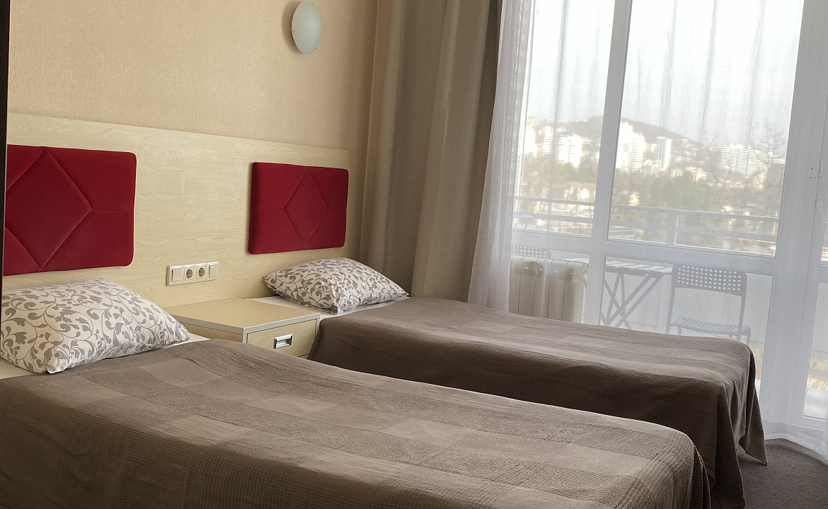 Стандарт с двумя раздельными кроватями. Отель Апартаменты Волна. Сочи Стандарт с двумя раздельными кроватями. Отель Апартаменты Волна. Сочи