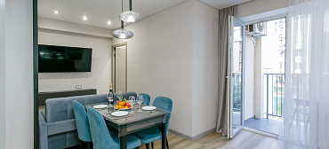 Квартира в многоквартирном доме Современный апартамент на первой береговой