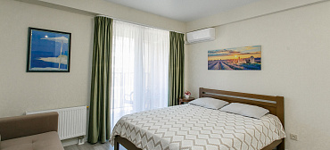 Квартира в многоквартирном доме Стильный апартамент на первой береговой с видом на море