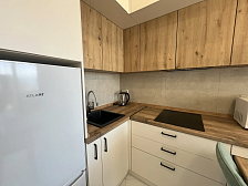 Квартира в многоквартирном доме Светлая студия на первой береговой линии