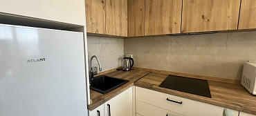 Квартира в многоквартирном доме Светлая студия на первой береговой линии