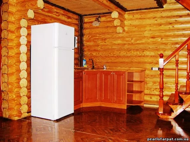 Двухэтажный деревянный коттедж категории 